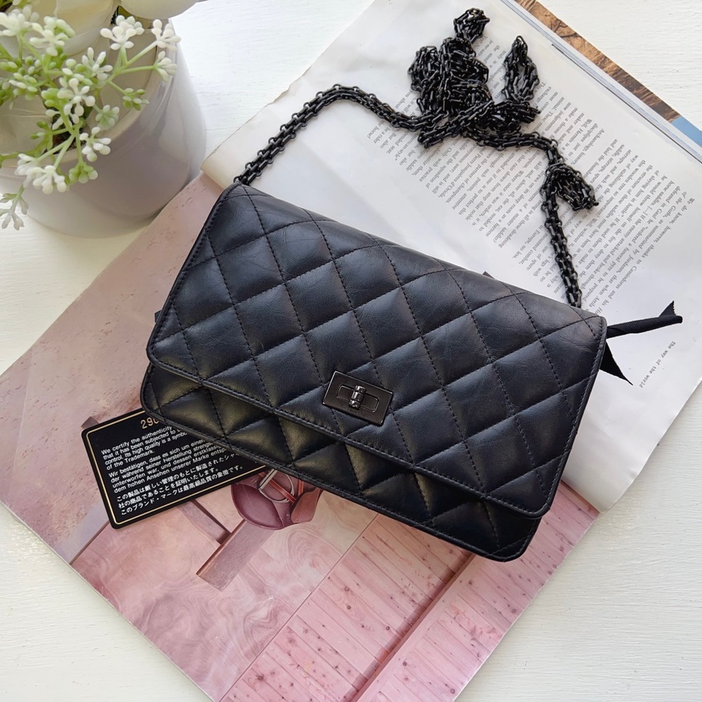 CHANEL Aged Calfskin Quilted Reissue WOC So Black